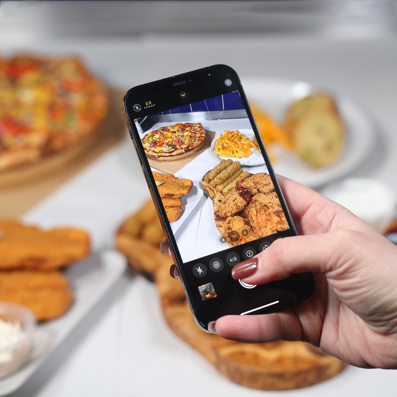 Taking a photo of Marini’s Baillieston Dishes 